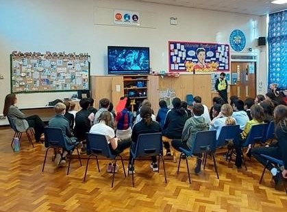 Year 6 children having a knife crime presentation from PCSOs